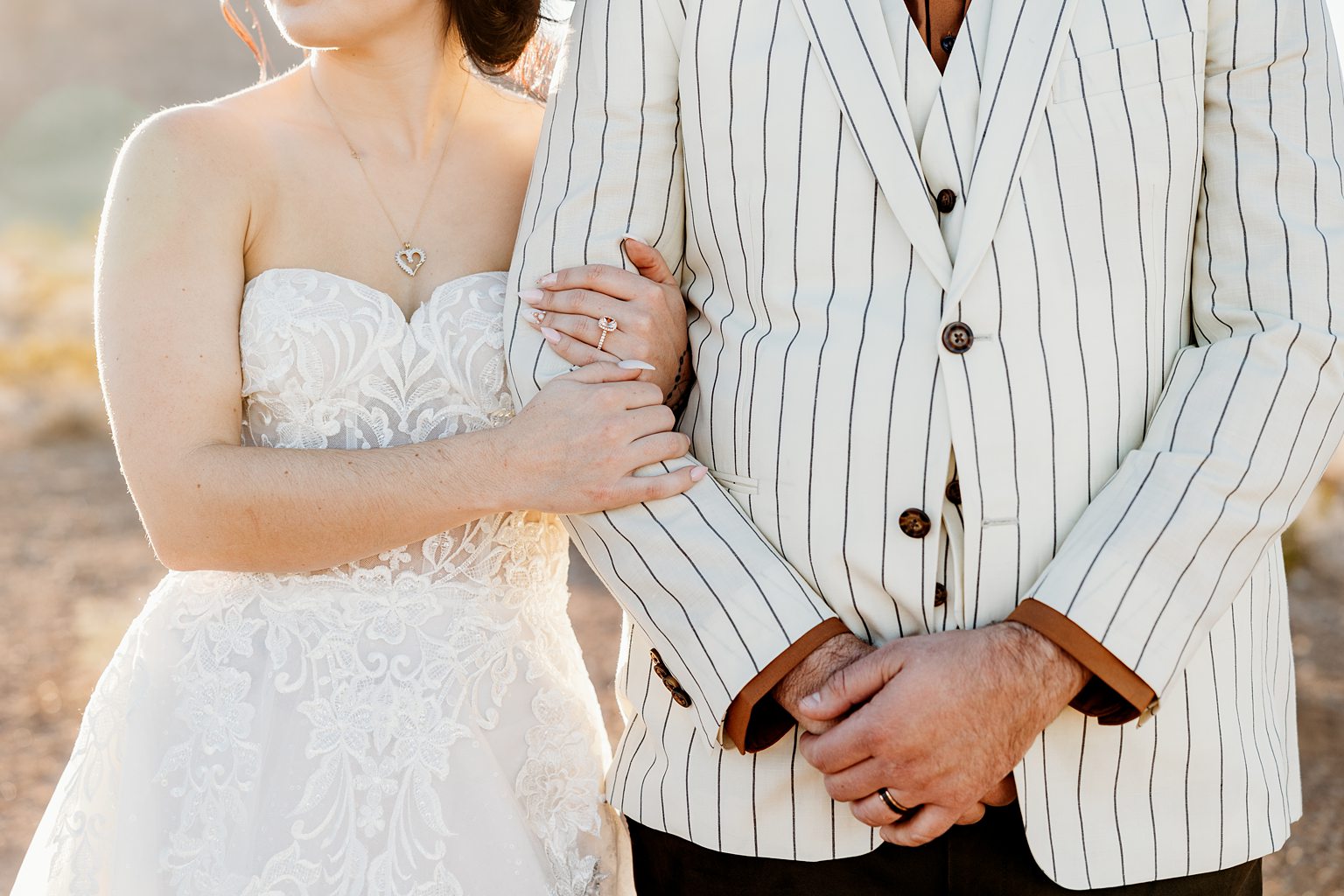 Close ups hot of a bride and groom posing for their  a Cactus Joe's wedding in Las Vegas