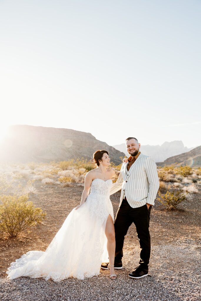 Couple posing in the desert for their Cactus Joe's wedding in Las Vegas