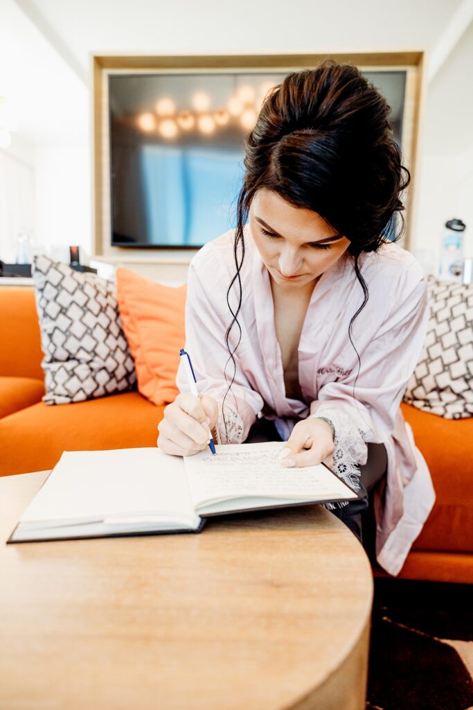 Bride writing her vows