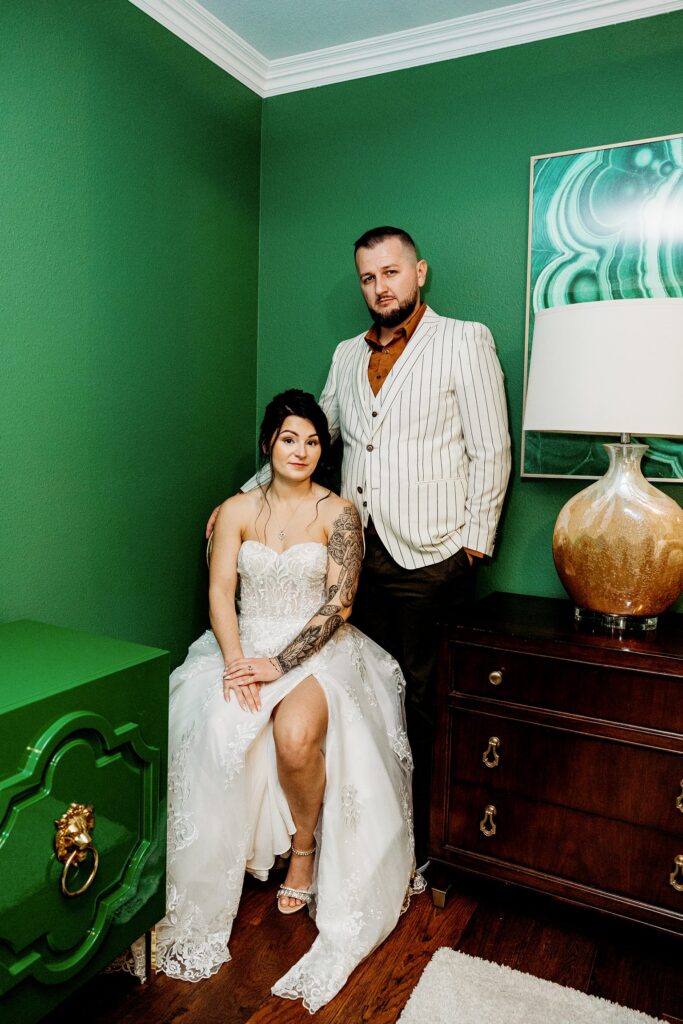 Bride and groom posing at Mid Century Manor in Las Vegas