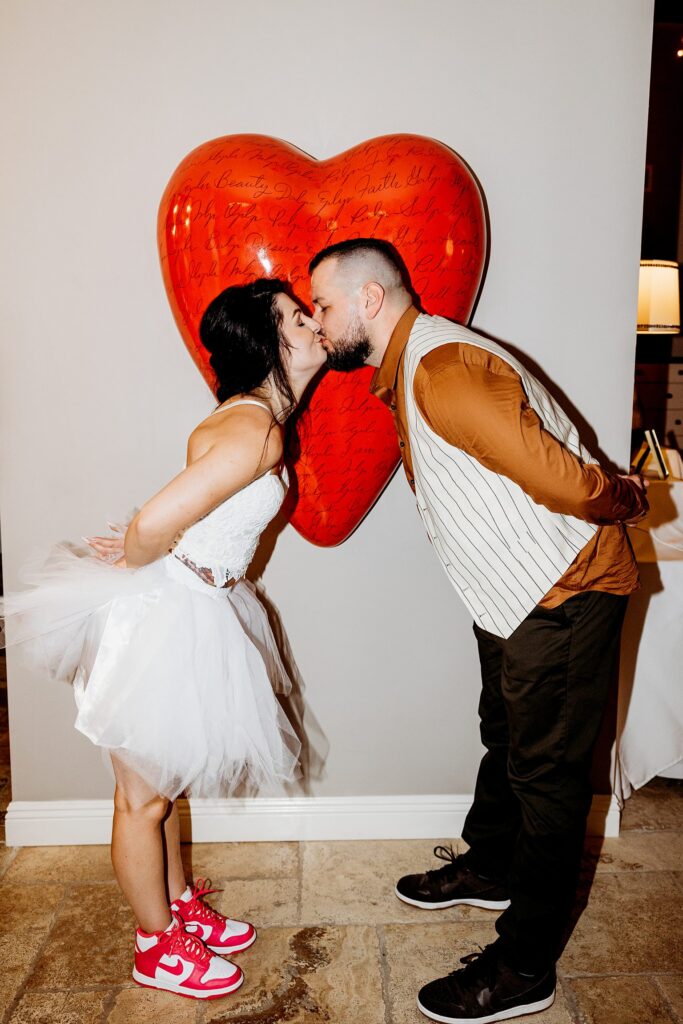 Bride and groom kissing