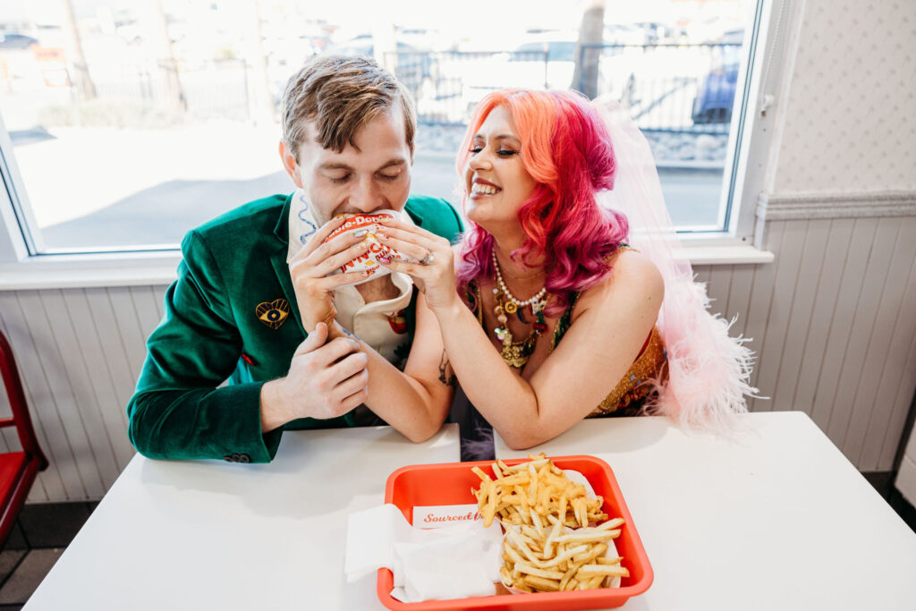 couple eating in n out after their elopement 