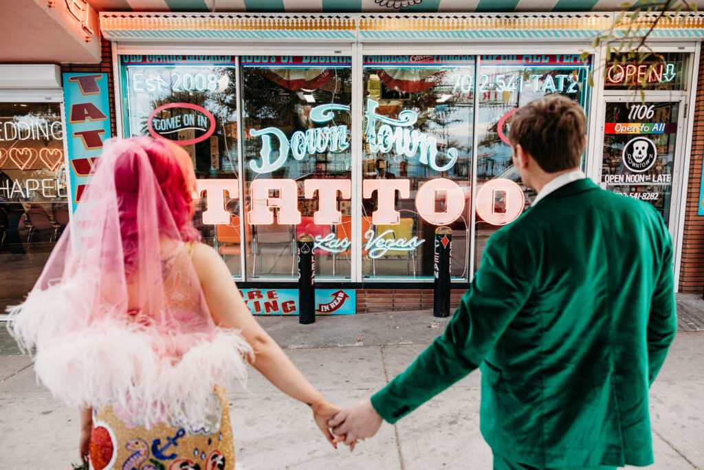 bride and groom getting a tattoo while in las vegas 