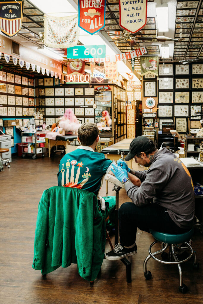 bride and groom getting tatted on their elopement day 