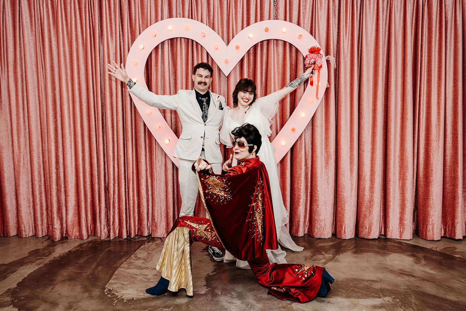 Couples Elvis Vegas vow renewal photos at Sure Thing Chapel