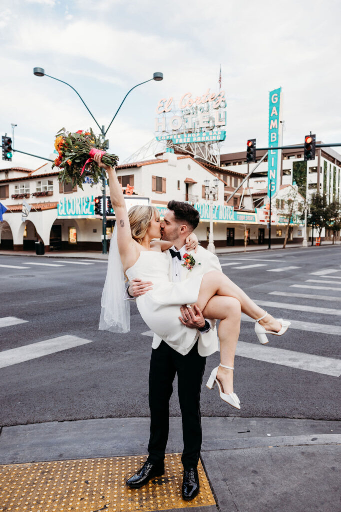 portrait of the newlyweds kissing