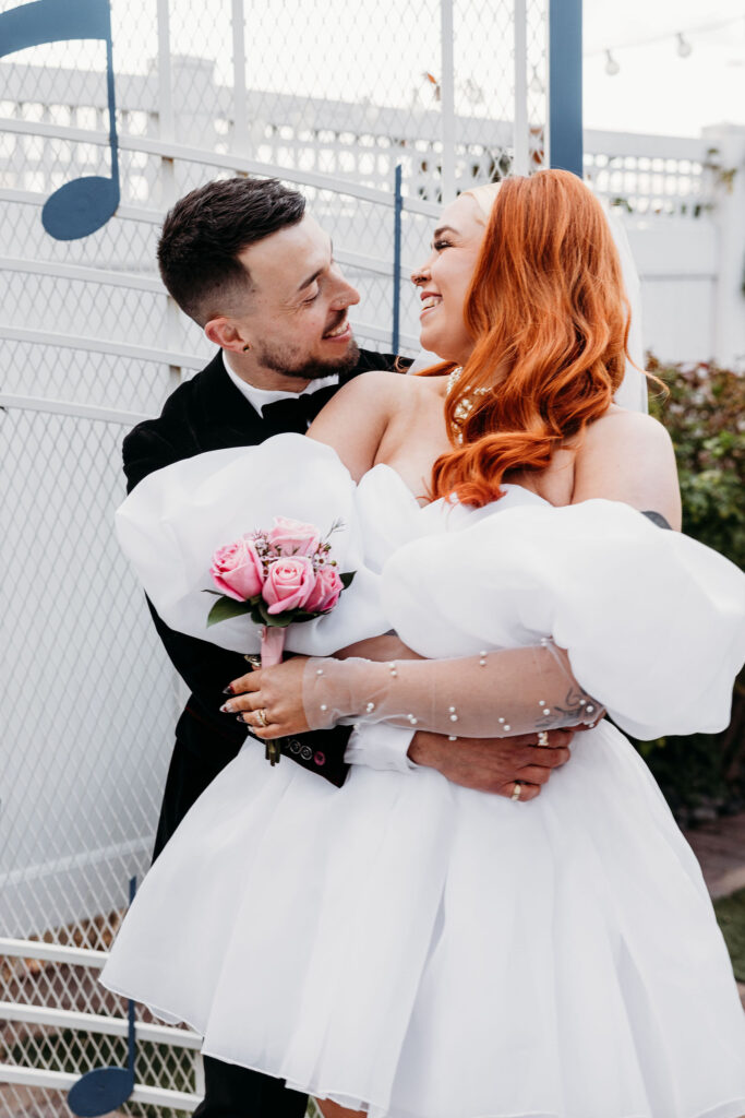 cute couple looking and smiling to each other after their ceremony