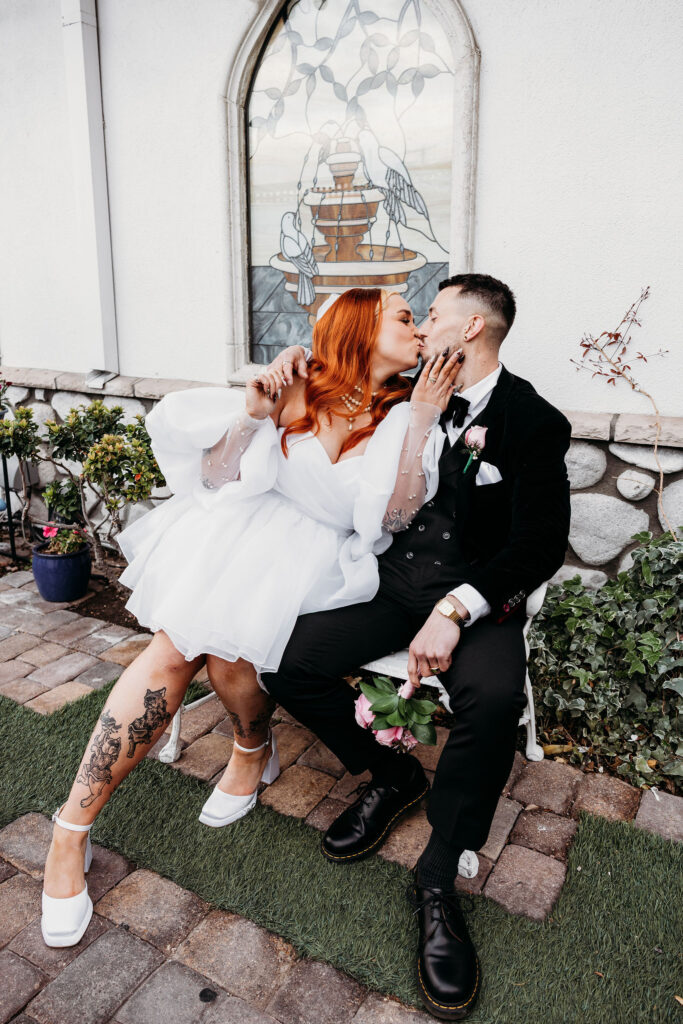 couple kissing during their photoshoot