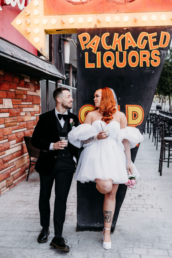 couple having a drink at atomic liquor in las vegas