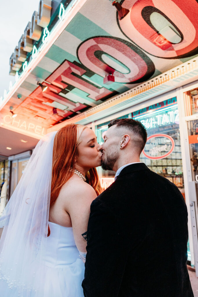 picture of the newly married couple kissing