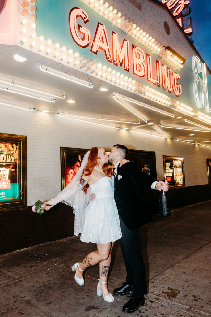 picture of the newly eloped couple kissing