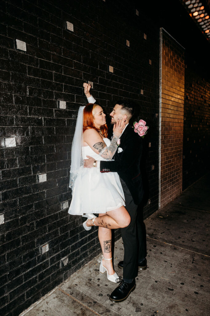 couple at fremont street during their photoshoot