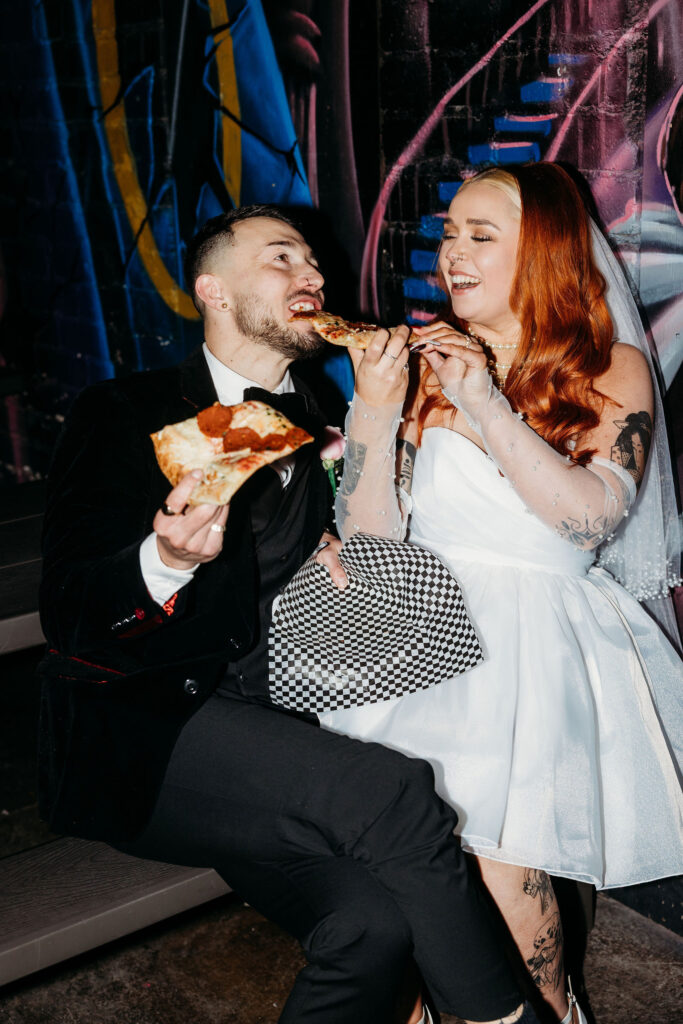 newlyweds having pizza in DTLV
