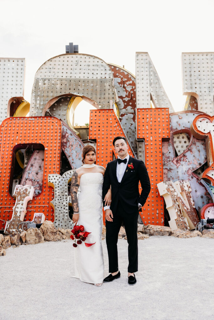 cute couple at their colorful vegas elopement