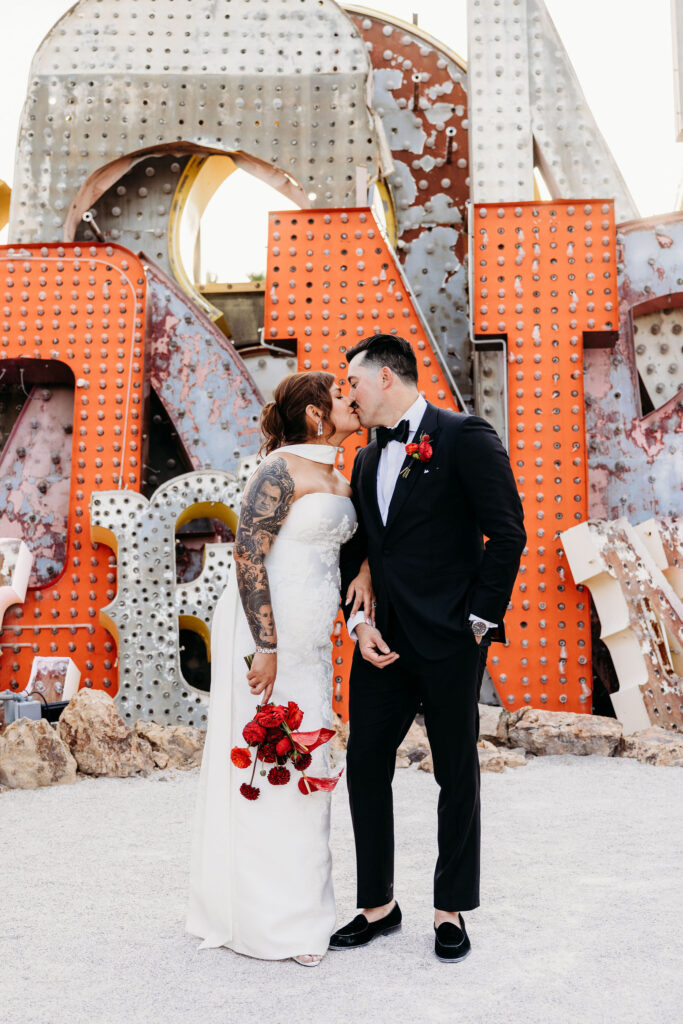 portrait of the bride and groom kissing