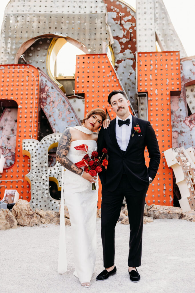 couple posing for the camera during their photoshoot