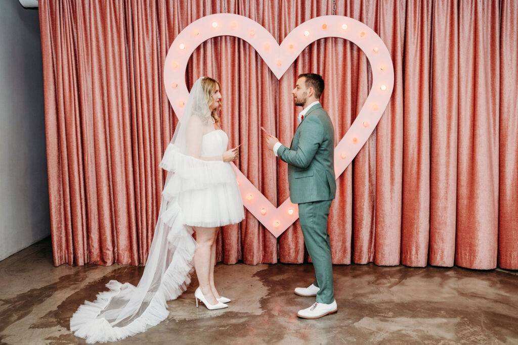 couple exchanging vows during their ceremony