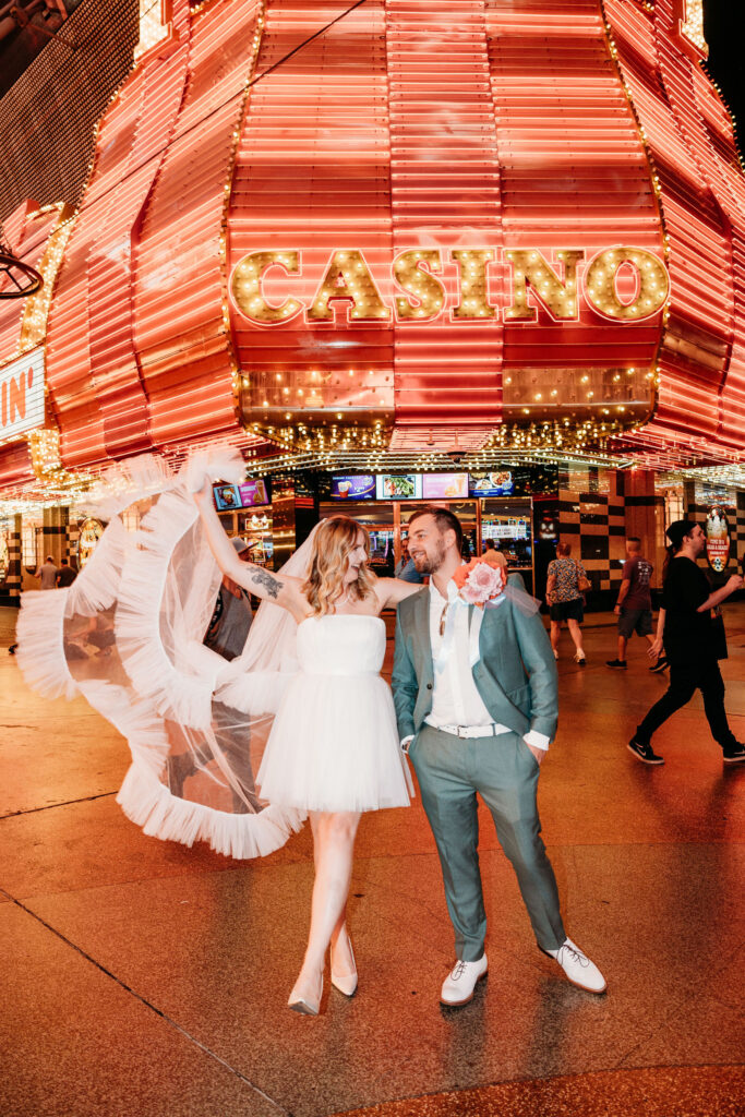 couple laughing with each other during their photoshoot