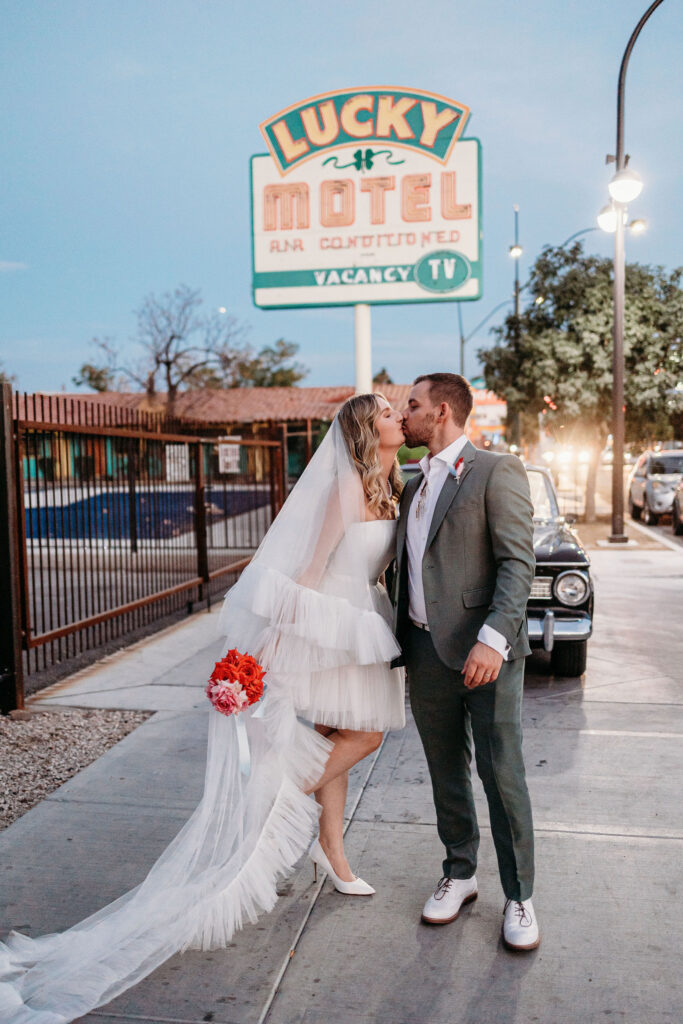 cute picture of the newlyweds kissing
