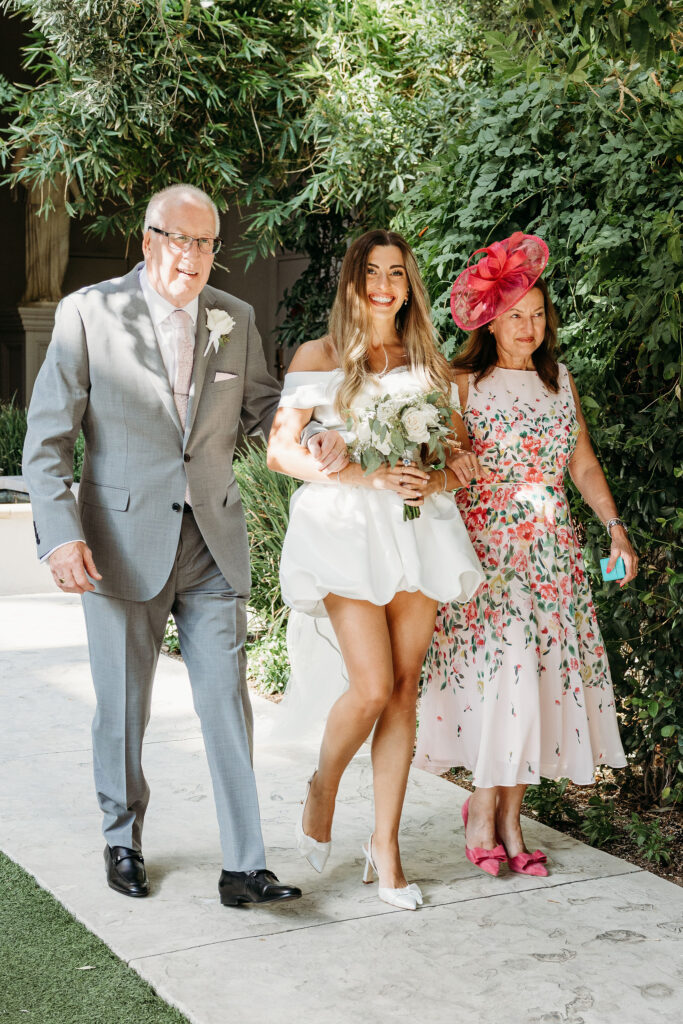 Stunning picture of the bride walking down the aisle