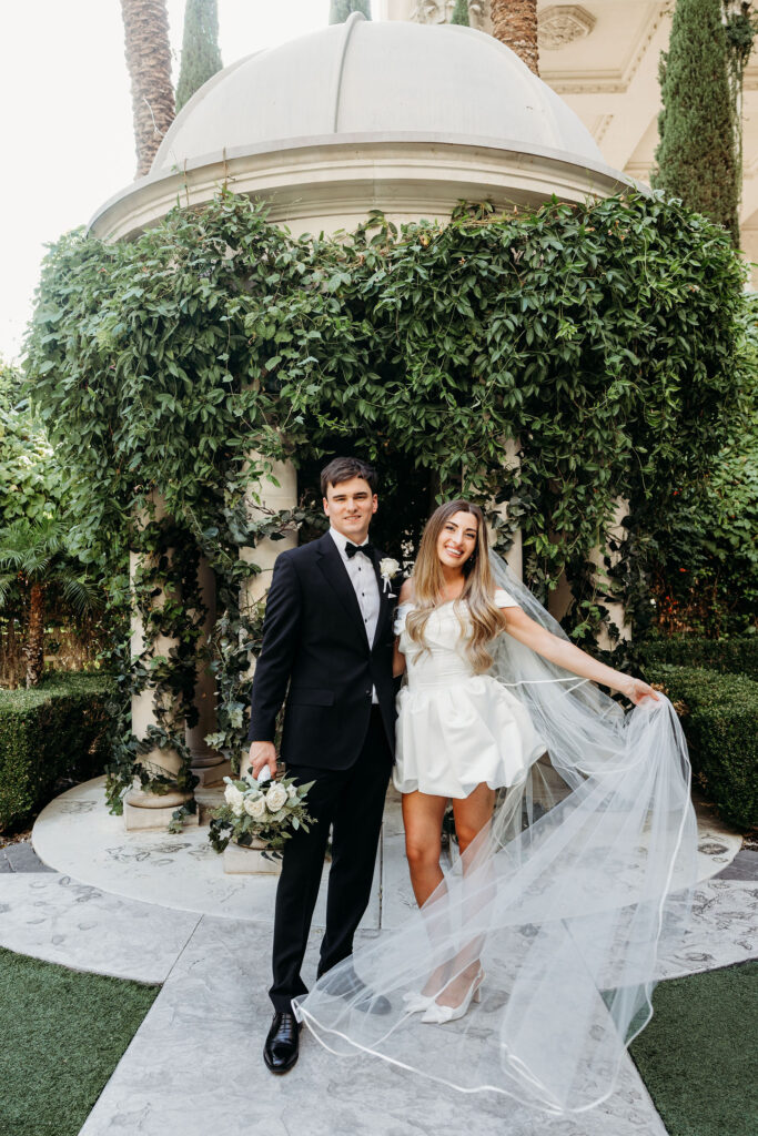 Happy couple before heading to their wedding reception