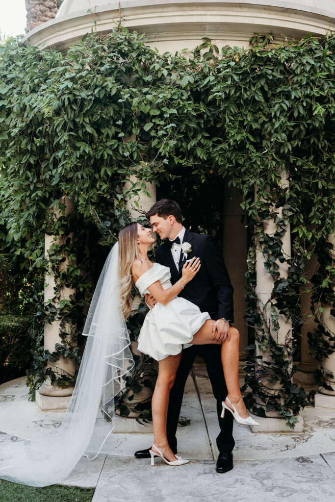 Portrait of the newly married couple smiling at each other