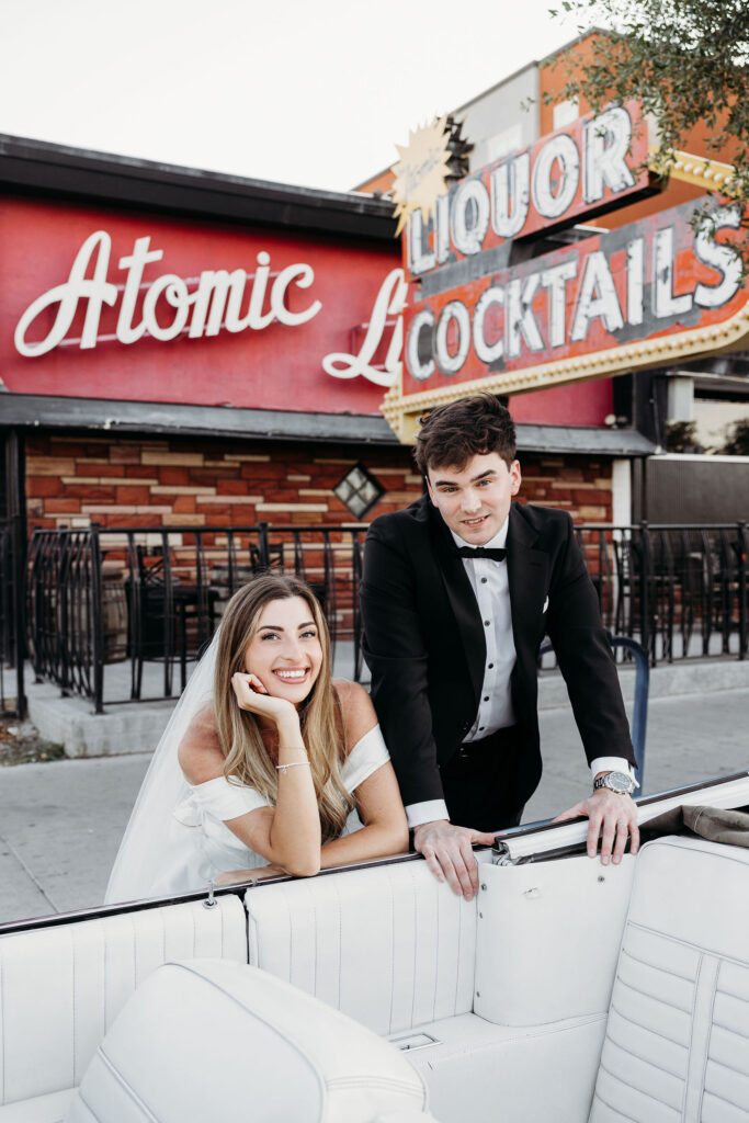 Newly married couple posing for the camera