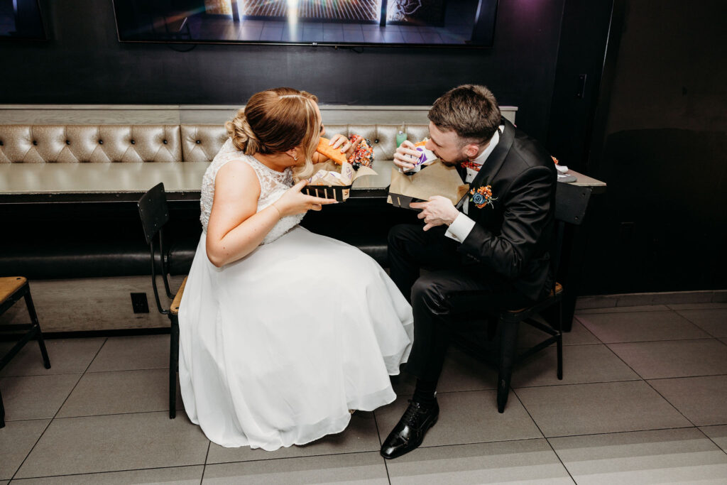 couple celebrating their elopement with taco bell