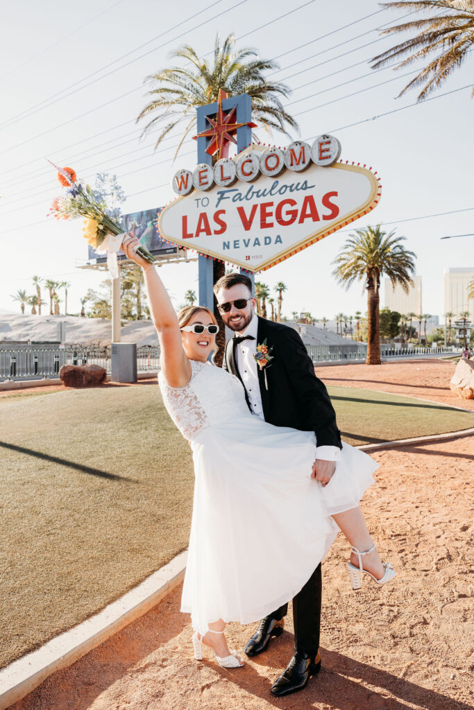 couple celebrating their elopement with champagne