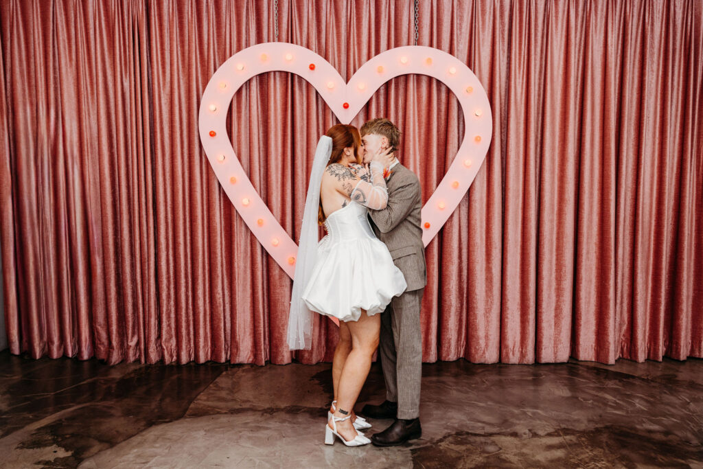 couple kissing after their ceremony