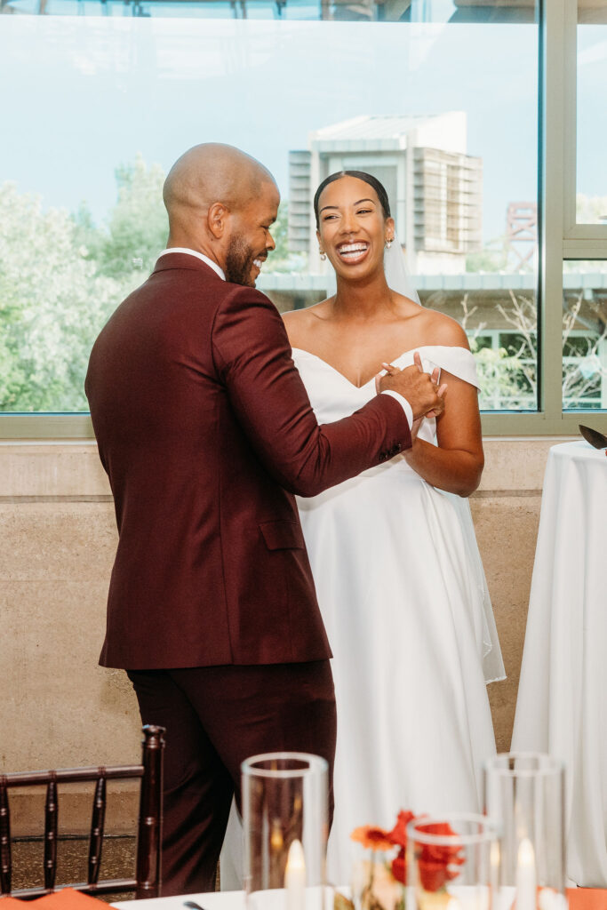 newlyweds dancing at their reception party