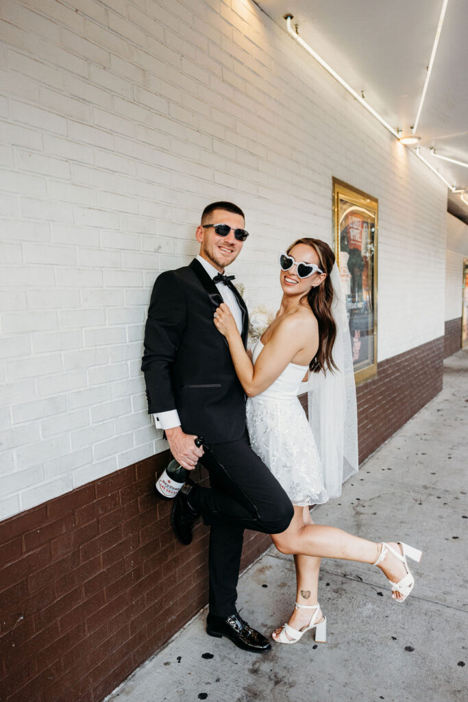 couple smiling at the camera during their session
