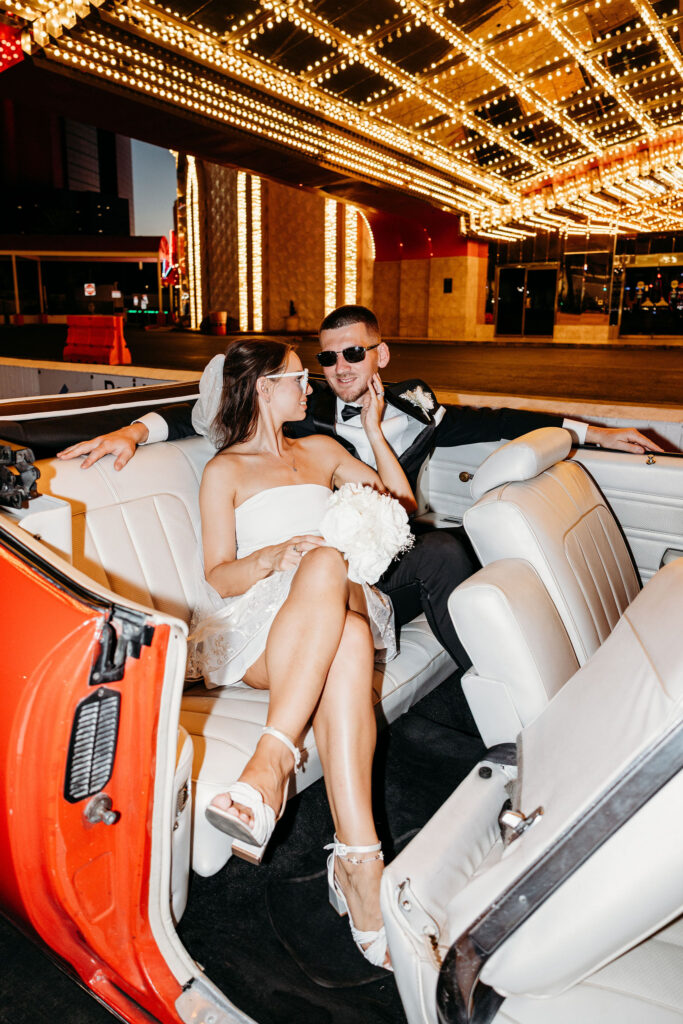 cute picture of the newlyweds smiling at each other 