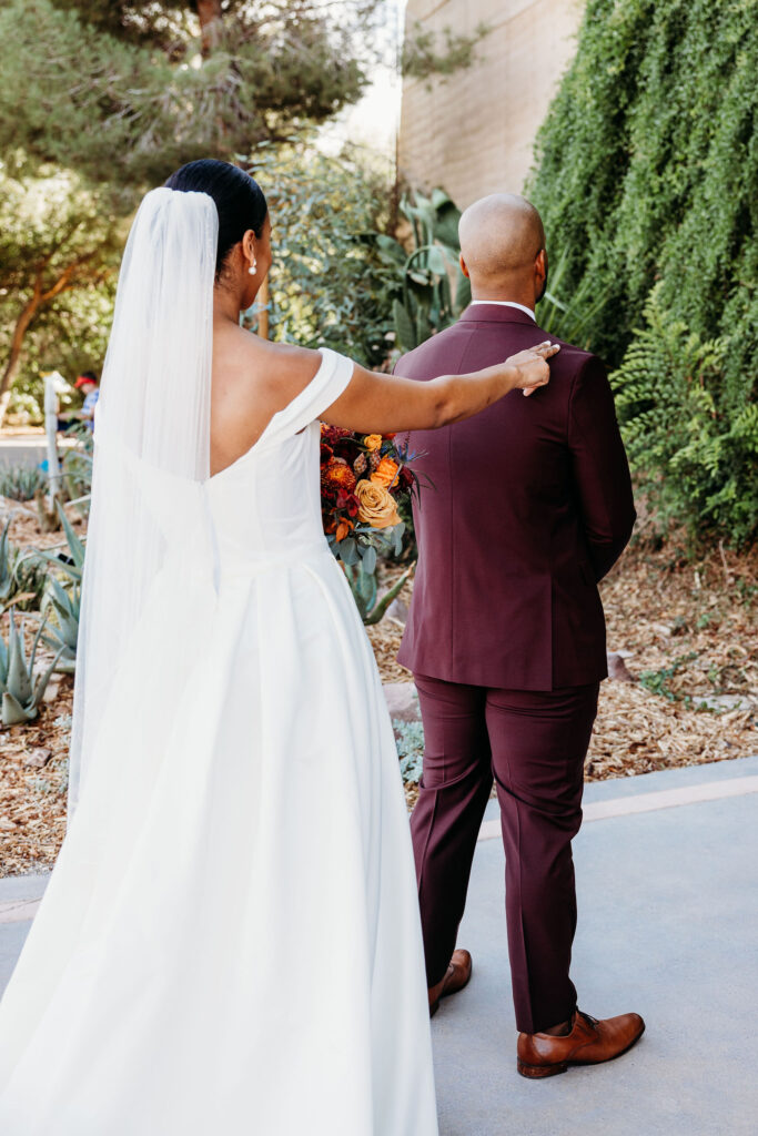 bride and groom at their first look