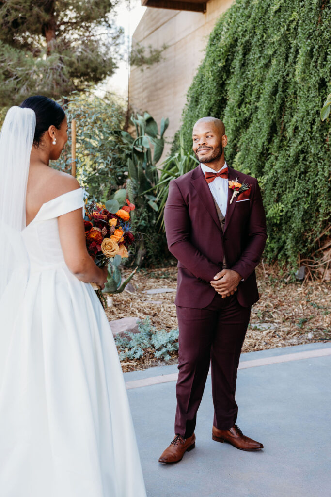 groom emotional seeing the bride in her wedding dress