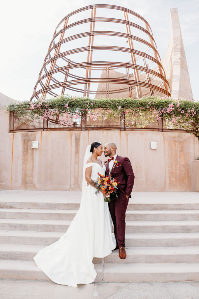 cute picture of the bride and groom smiling at each other