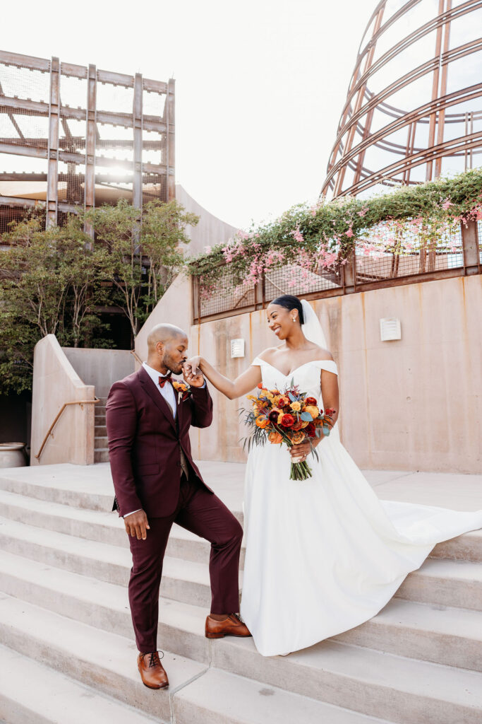 portrait of the bride and groom holding hands during their bridal session