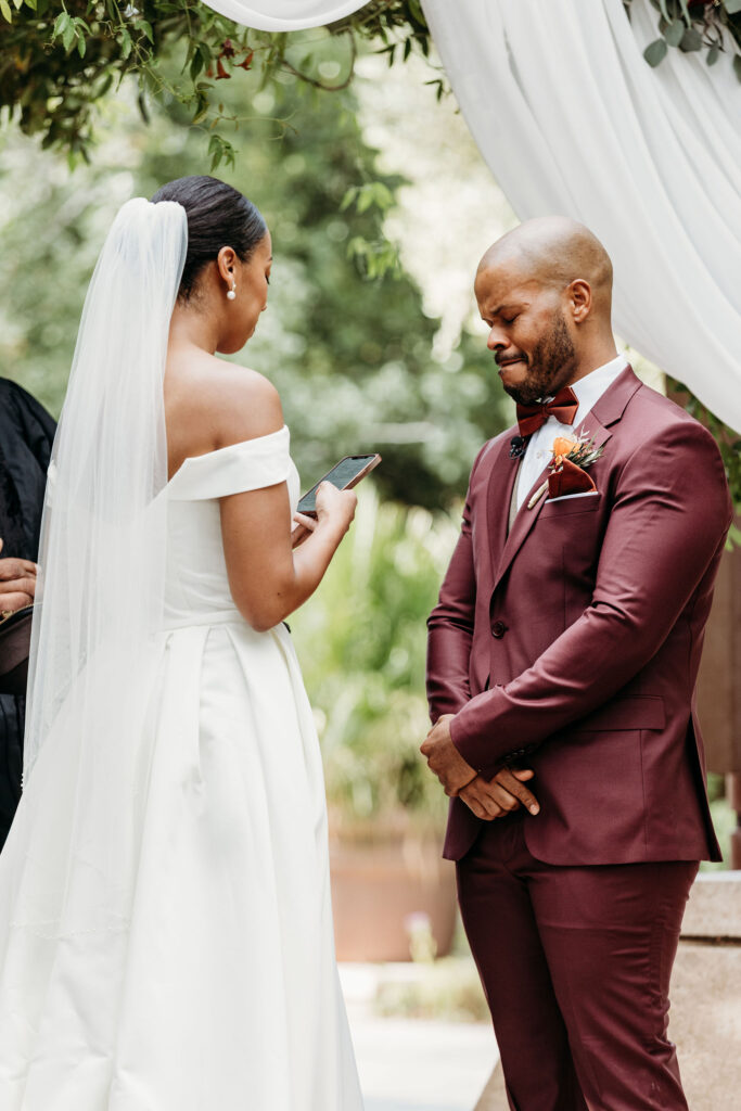 groom emotional during his wedding ceremony