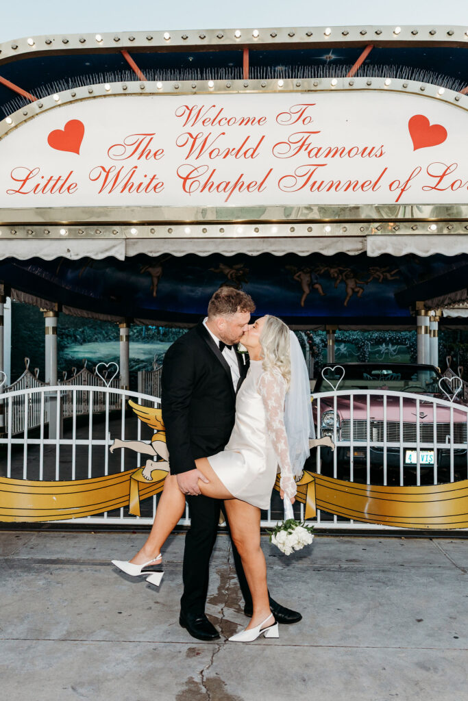 cute picture of the bride and groom kissing
