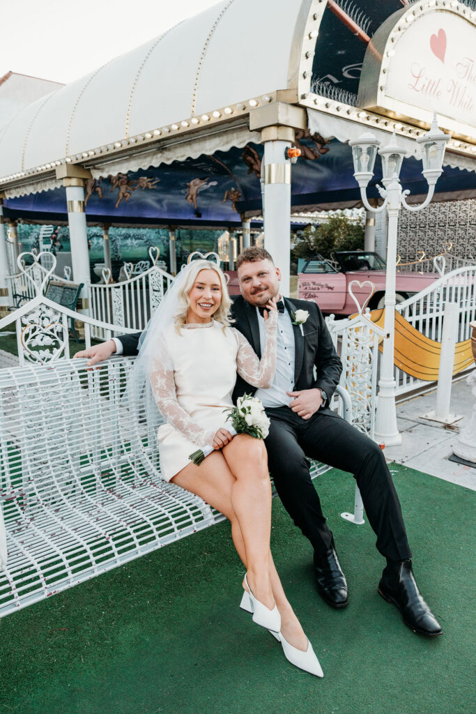 bride and groom smiling at each other