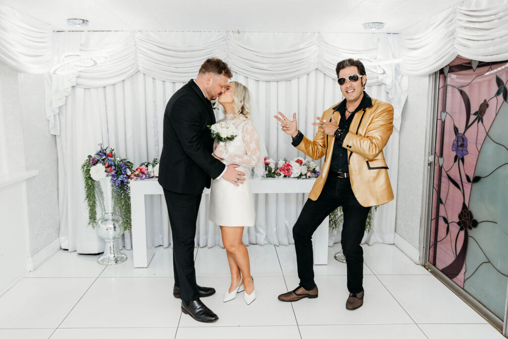 bride and groom kissing after their ceremony