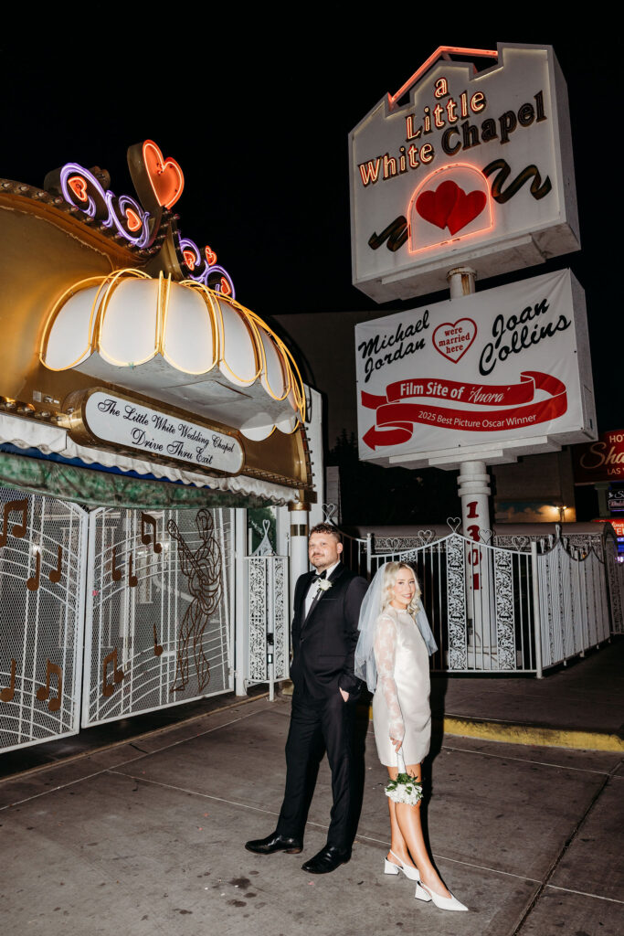 portrait of the newlyweds holding hands