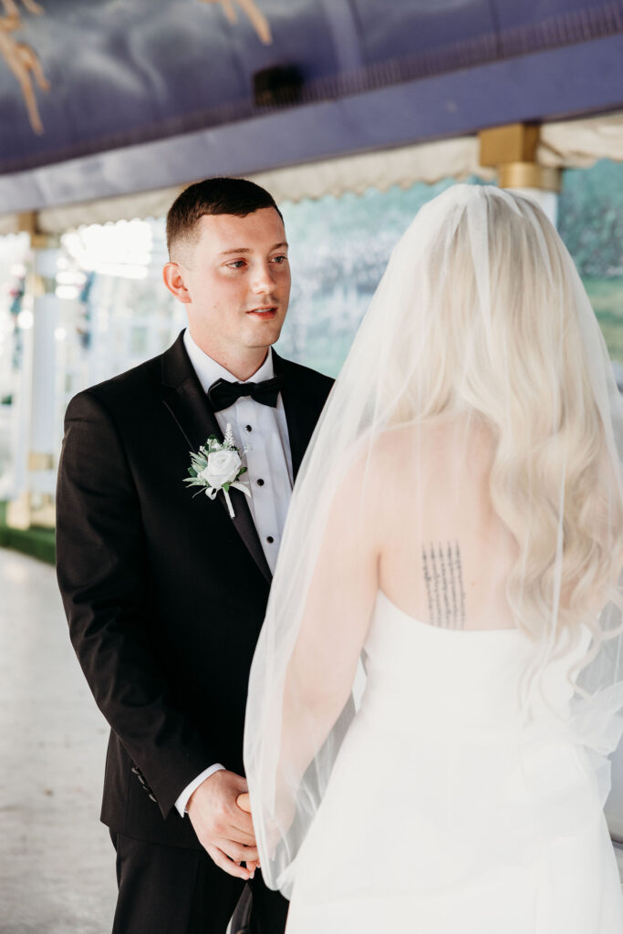 groom emotional during her ceremony