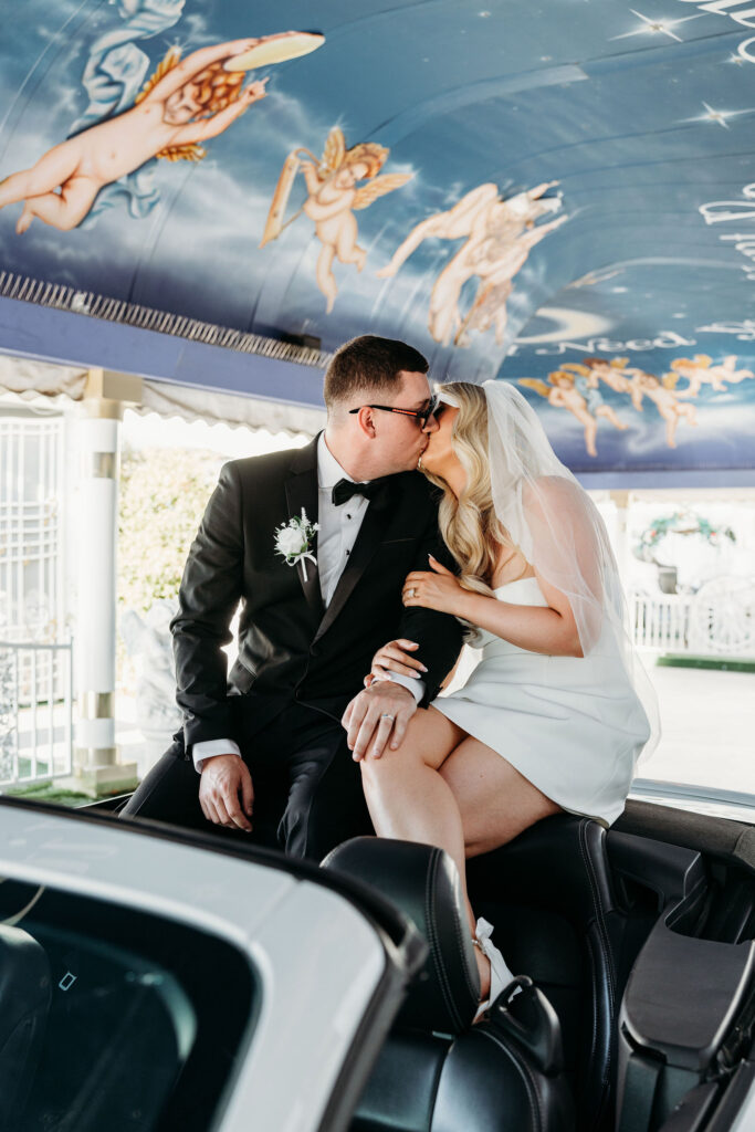 cute picture of the newlyweds kissing