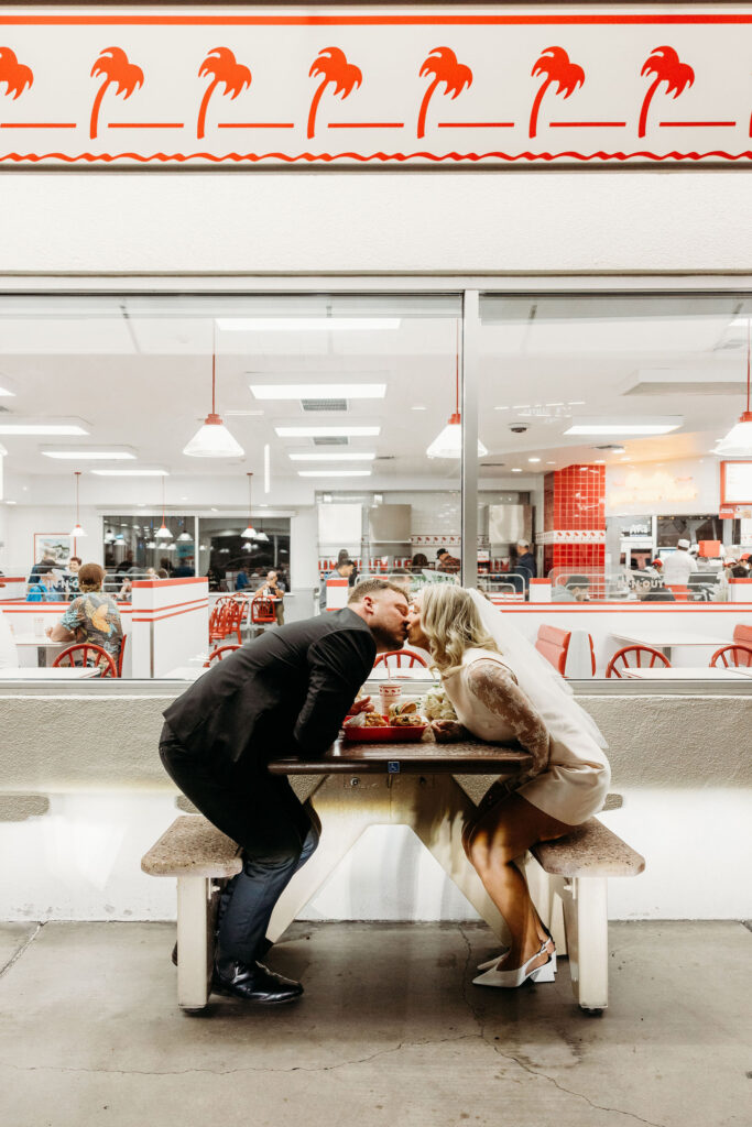 cute picture of the newlyweds kissing