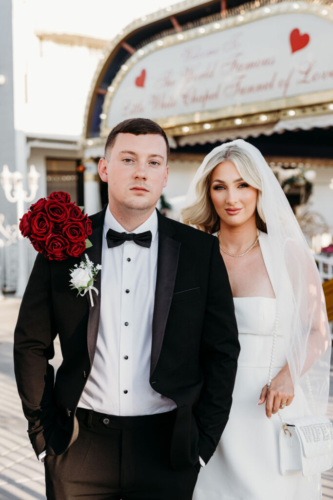 couple smiling at the camera during their photoshoot