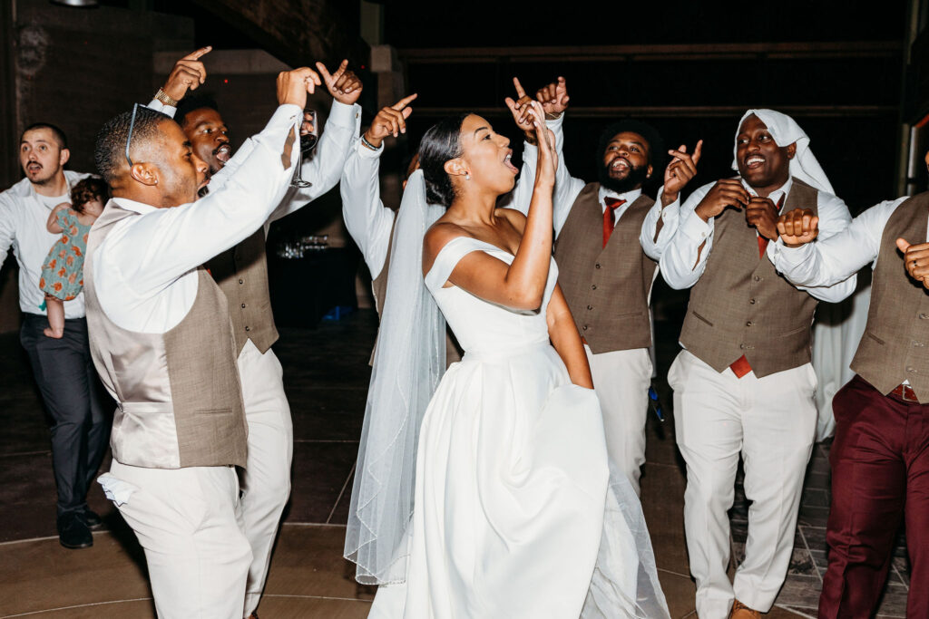 guests dancing at the wedding reception