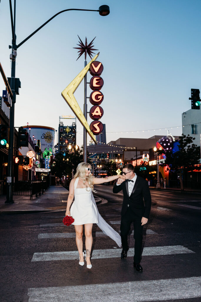 newlyweds holding hands during their photoshoot