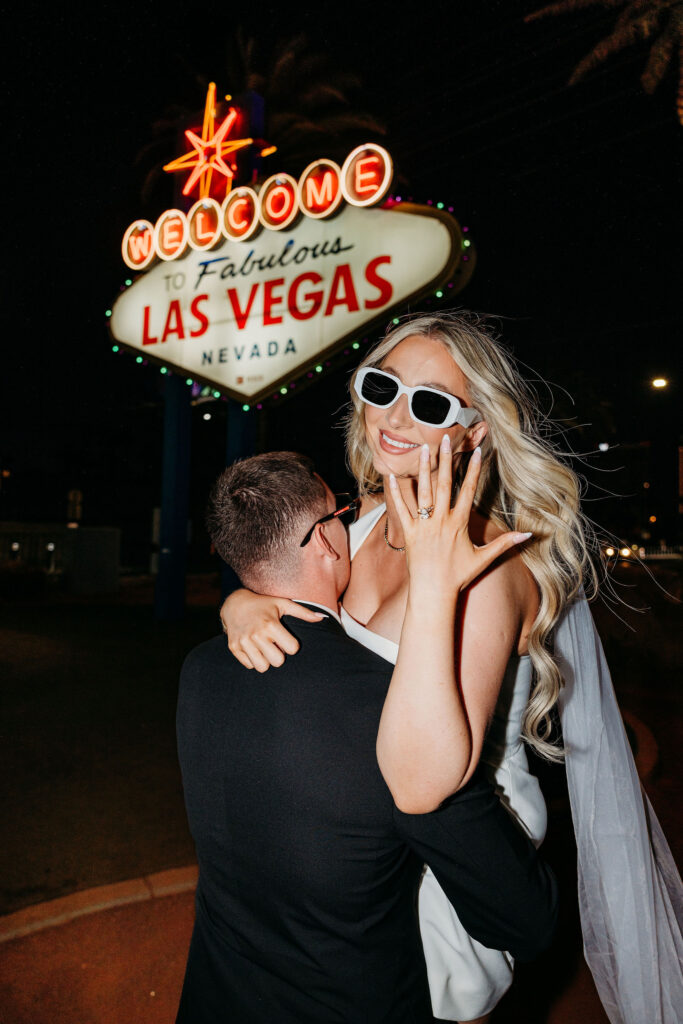 portrait of the bride showing her wedding ring