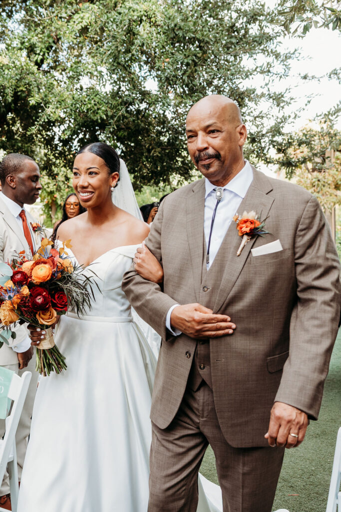 cute picture of the bride walking down the aisle